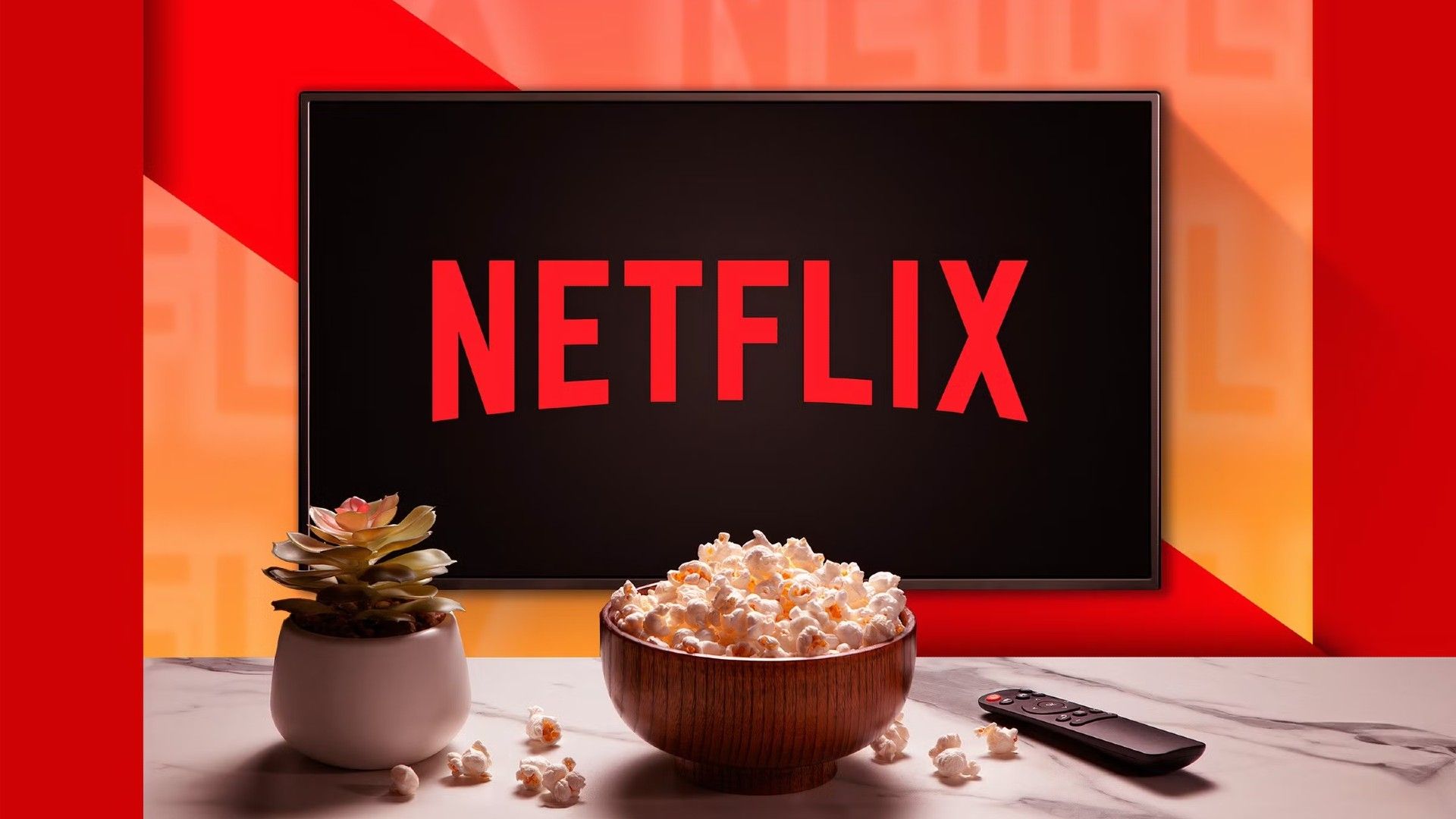 a-tv-with-the-netflix-logo-with-a-plant-a-popcorn-bowl-and-a-remote-control-on-a-table.jpg